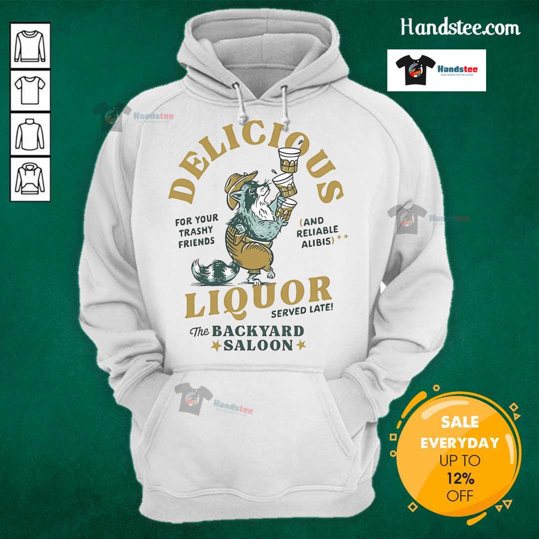 Cozy 'Nice Delicious Liquor Raccoon' hoodie displayed in a backyard saloon setting, perfect for casual wear and outdoor fun.