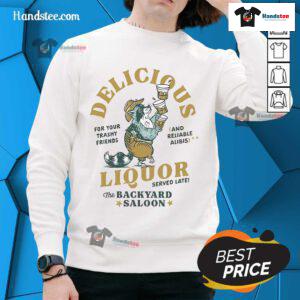 Nice Delicious Liquor Raccoon sweatshirt in a backyard saloon setting, perfect for cozy casual wear and animal lovers.