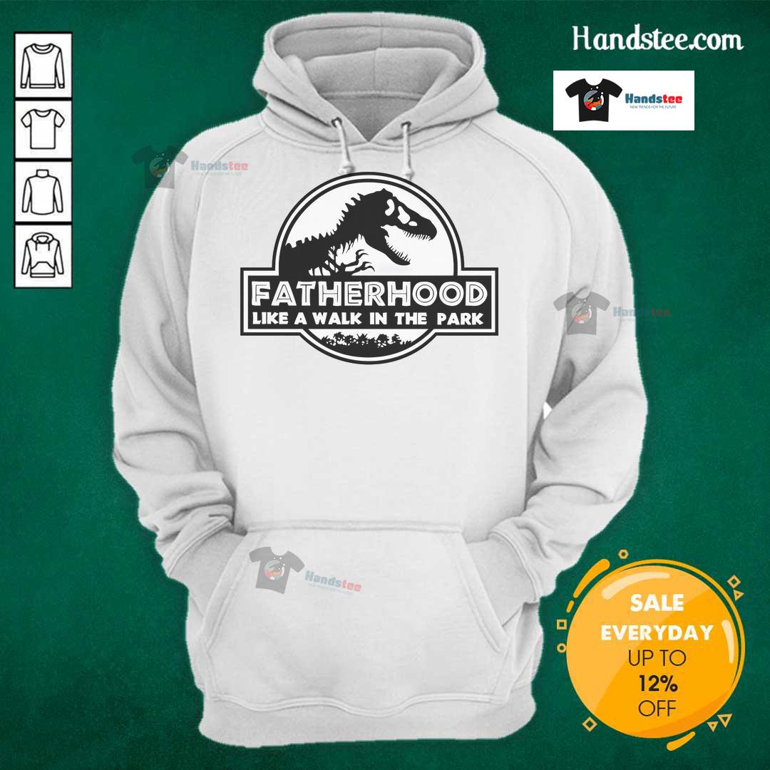 Dad wearing a dinosaur hoodie, enjoying a walk in the park, showcasing fun and playful fatherhood moments.