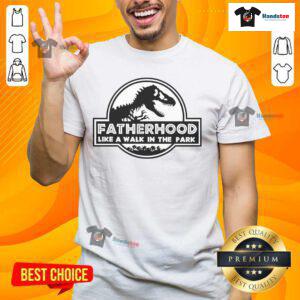 Fatherhood T-Shirt featuring a fun dinosaur design, perfect for dads who enjoy a walk in the park with their kids.
