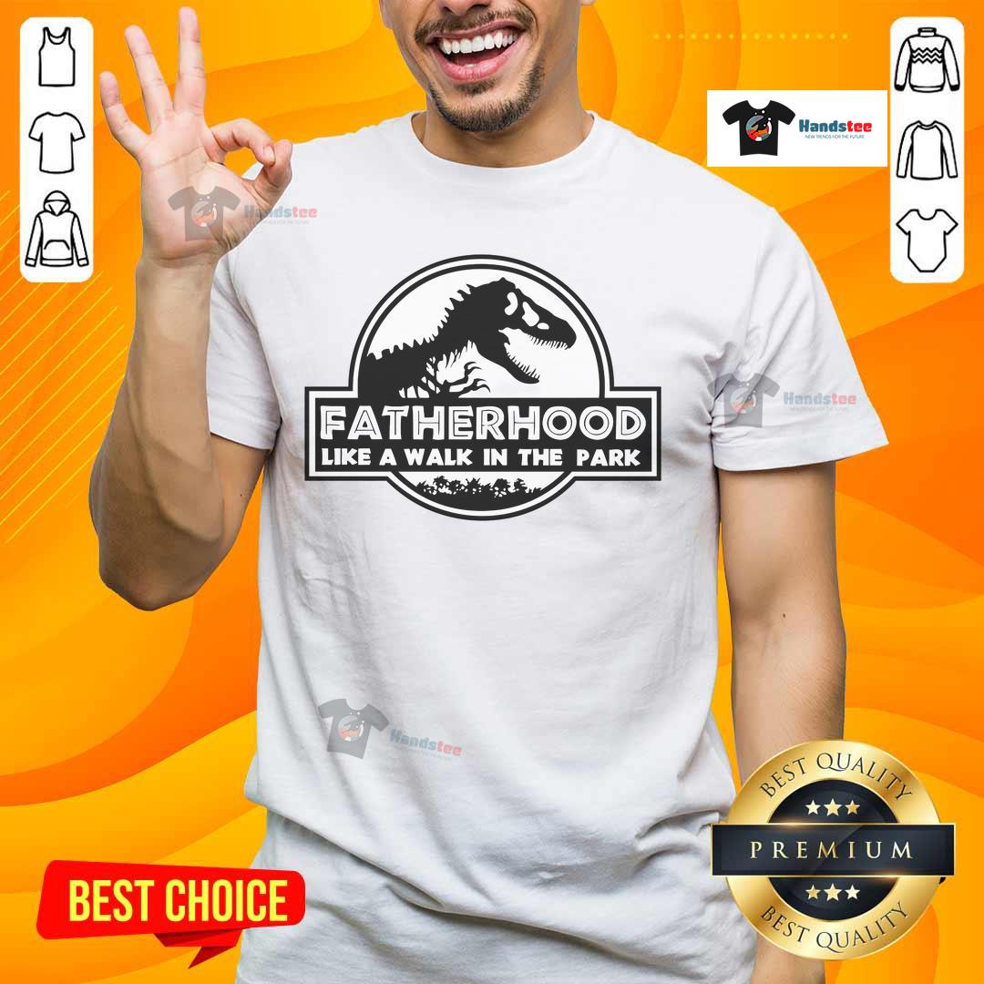 Fatherhood T-Shirt featuring a fun dinosaur design, perfect for dads who enjoy a walk in the park with their kids.