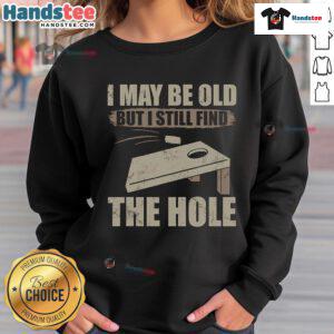 Alt Text: Nice I May Be Old But I Still Find The Hole Cornhole Sweatshirt design showcasing fun cornhole-themed graphic.