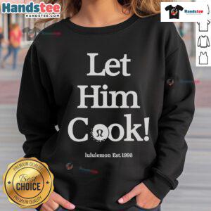 Min Woo Lee wearing a Lululemon 'Let Him Cook' golf sweatshirt, established 1998, showcasing a stylish and sporty look.