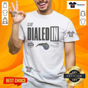 Alt Text: Official Dialed In Orlando Magic 2025 Southeast Division Champions T-Shirt featuring team logo and vibrant design.