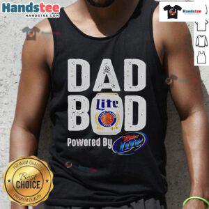 Man wearing a 'Good Dad Bod Powered by Miller Lite' tank top, enjoying a sunny day outdoors with friends.