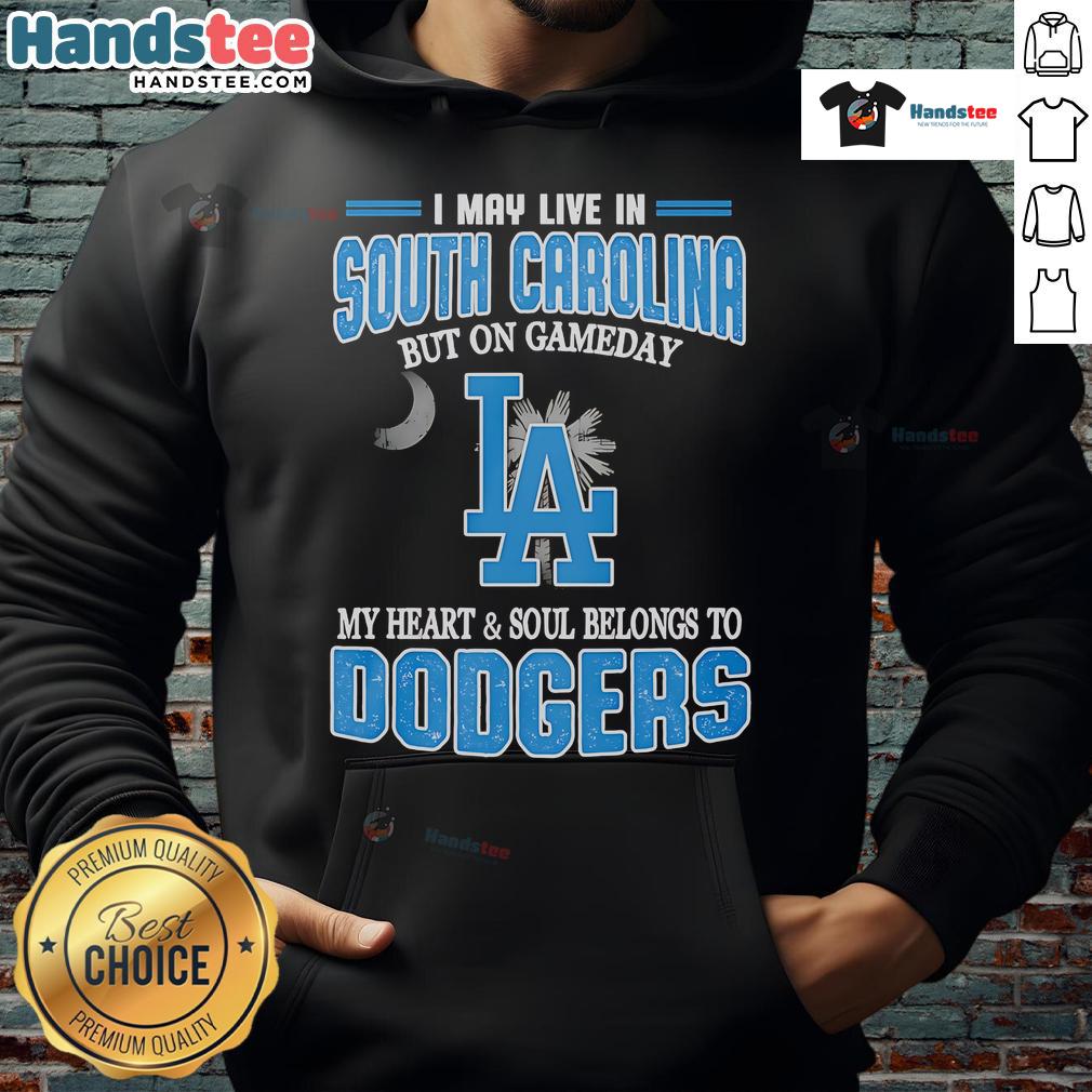 Alt Text: Person wearing 'Happy I May Live In South Carolina But On Gameday My Heart And Soul Belongs To Dodgers' hoodie