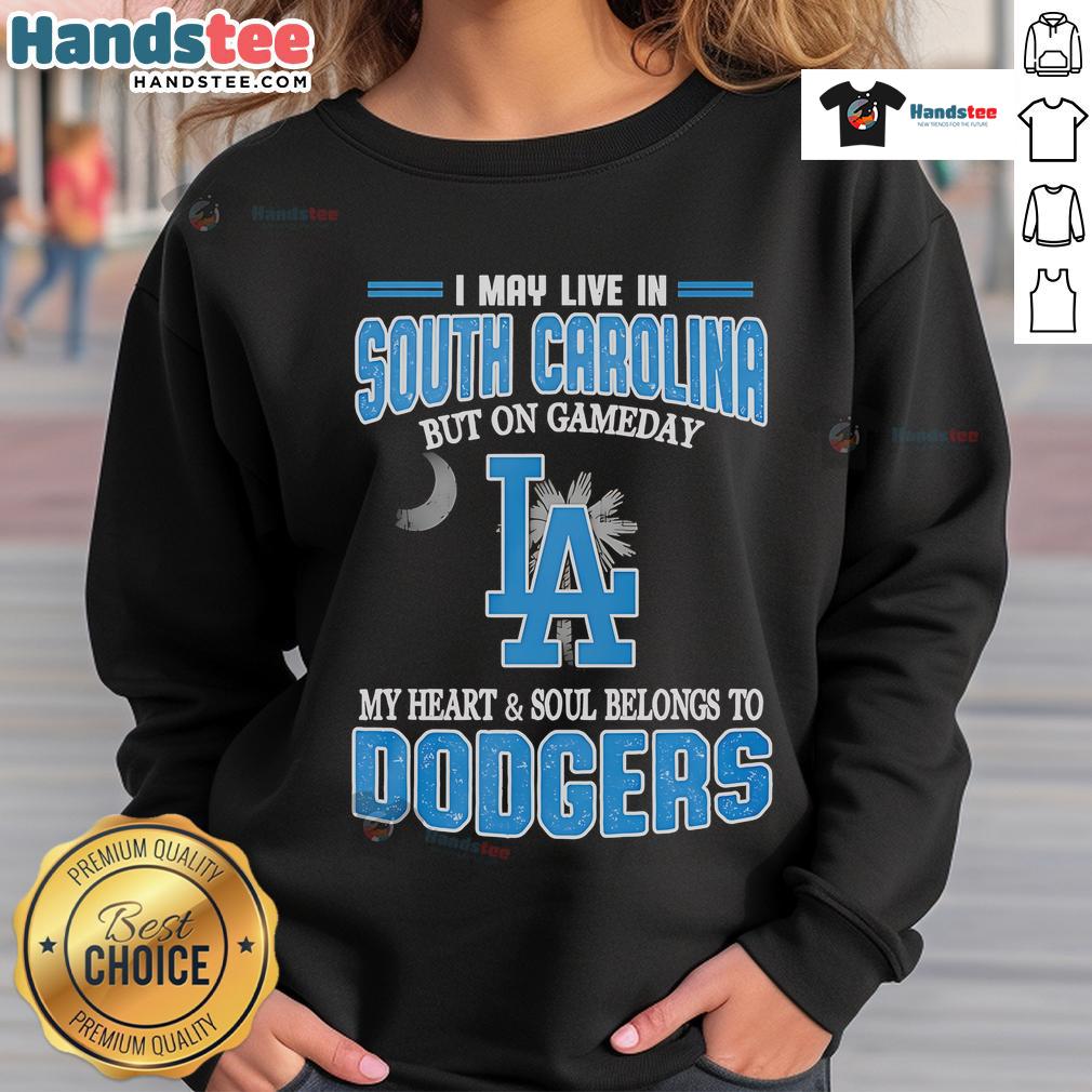 Alt Text: Cozy sweatshirt featuring Happy I May Live in South Carolina But On Gameday My Heart Belongs to Dodgers design.