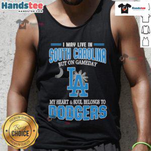 Alt Text: Woman wearing a Dodgers tank top, showcasing pride for the team while living in South Carolina on game day.