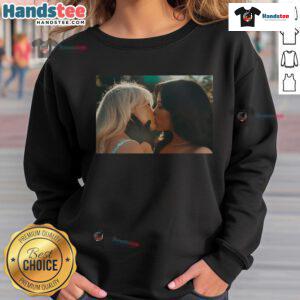 Hot Sabrina Carpenter and Jenna Ortega kiss in stylish murder sweatshirt, showcasing trendy pop culture fashion.