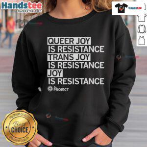 Hot The Project QC Queer Joy Is Resistance sweatshirt showcasing vibrant design celebrating trans joy and LGBTQ+ pride.