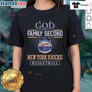 Alt Text: New York Knicks Basketball God graphic tee for men, featuring 'First Family, Second' slogan in team colors.