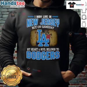 Person wearing a Dodgers hoodie, showcasing pride for the team despite living in New Jersey on game day.