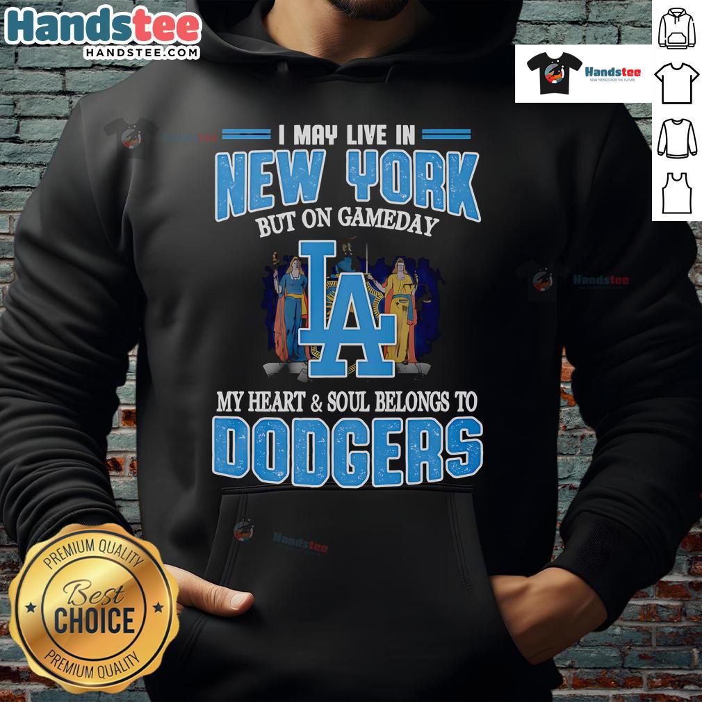 Person wearing a Dodgers hoodie, celebrating game day with pride while living in New York.