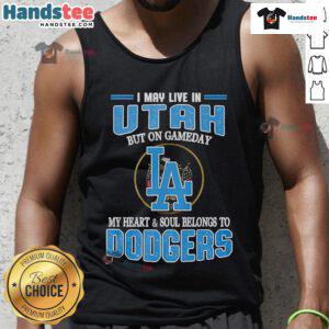 Alt Text: Woman wearing a Dodgers tank top, expressing loyalty to the team despite living in Utah on game day.
