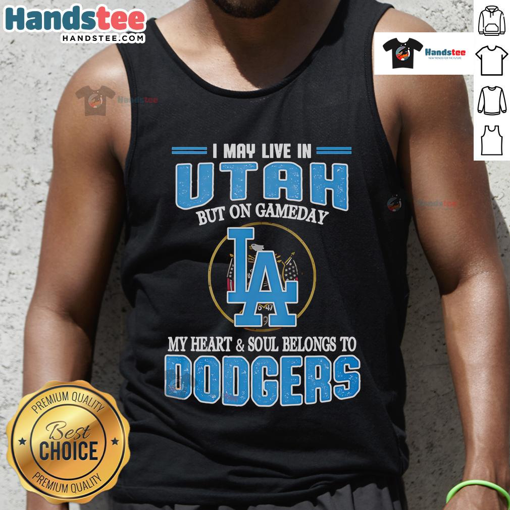 Alt Text: Woman wearing a Dodgers tank top, expressing loyalty to the team despite living in Utah on game day.