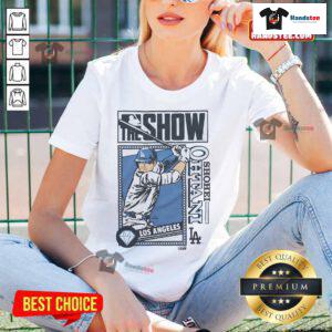 Alt Text: Nice MLB The Show Dodgers Shohei Ohtani Ladies Tee featuring vibrant graphics and comfortable fit for female fans.