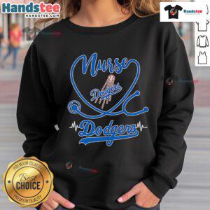 Nice nurse wearing a Los Angeles Dodgers sweatshirt, showcasing team spirit and style in a casual setting.