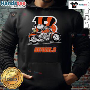 Snoopy and Woodstock riding a motorbike in a Cincinnati Bengals hoodie, showcasing playful fandom style.