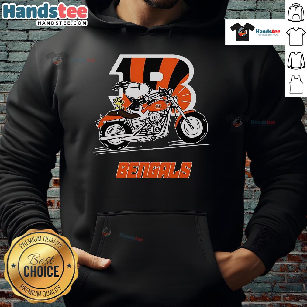 Snoopy and Woodstock riding a motorbike in a Cincinnati Bengals hoodie, showcasing playful fandom style.