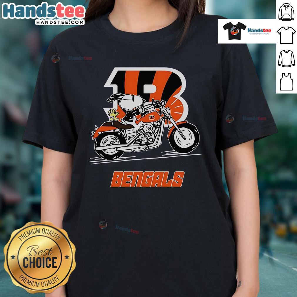 Snoopy and Woodstock riding a motorbike on a Cincinnati Bengals ladies tee, showcasing fun team spirit and style.