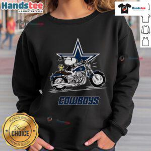Alt Text: Snoopy and Woodstock riding a motorbike in a Dallas Cowboys sweatshirt, perfect for fans of the iconic duo.