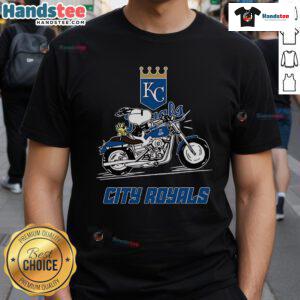 Alt Text: Snoopy and Woodstock riding a motorbike on a Kansas City Royals T-shirt design, perfect for fans and collectors.