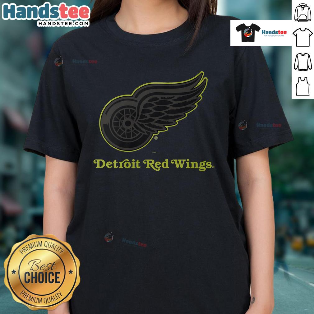Alt Text: Official Detroit Red Wings Highlight Reel Ladies Tee featuring team logo and vibrant design for female fans.