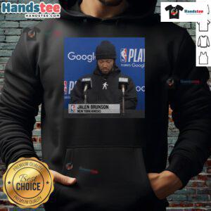 Jalen Brunson at official press conference wearing a stylish hoodie, showcasing his casual yet professional look.