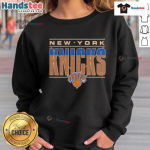 Official New York Knicks striped sweatshirt featuring team colors and logo, perfect for fans and casual wear.