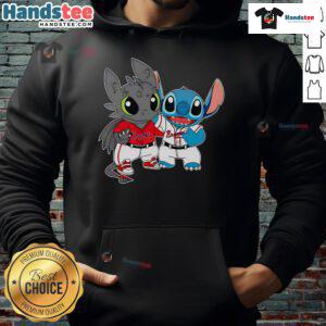 Alt Text: Cute Toothless Night Fury and Stitch in Atlanta Braves baseball hoodie, perfect for fans and cozy casual wear.