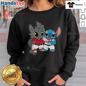 Alt Text: Cute Toothless Night Fury and Stitch design on an Atlanta Braves baseball sweatshirt, perfect for fans and collectors.