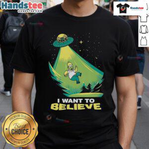 Alt Text: Funny I Want To Believe Homer Simpson UFO T-Shirt featuring iconic cartoon character and playful alien theme.