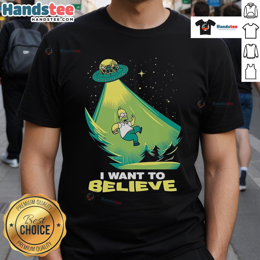 Alt Text: Funny I Want To Believe Homer Simpson UFO T-Shirt featuring iconic cartoon character and playful alien theme.