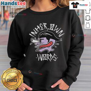 Funny In Her Own Words sweatshirt featuring a playful face and tongue design, perfect for humor lovers and casual wear.