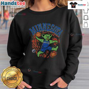 Good Homage Navy Minnesota Timberwolves Grateful Dead Sweatshirt showcasing vibrant graphics and cozy design.