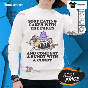 Alt Text: Cozy sweatshirt featuring the phrase Good Stop Eating Cakes With The Fakes perfect for Bundt cake lovers.