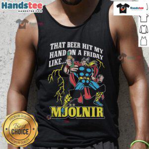Man wearing 'Good That Beer Hit My Hand On A Friday Like Mjolnir' tank top, enjoying a sunny day outdoors with friends.