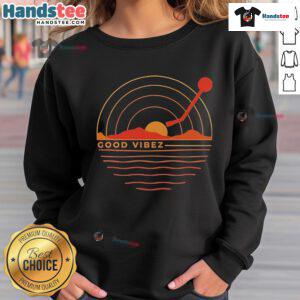 Good Vibez Record Sunset Sweatshirt featuring a vibrant sunset design, perfect for cozy, stylish evenings.