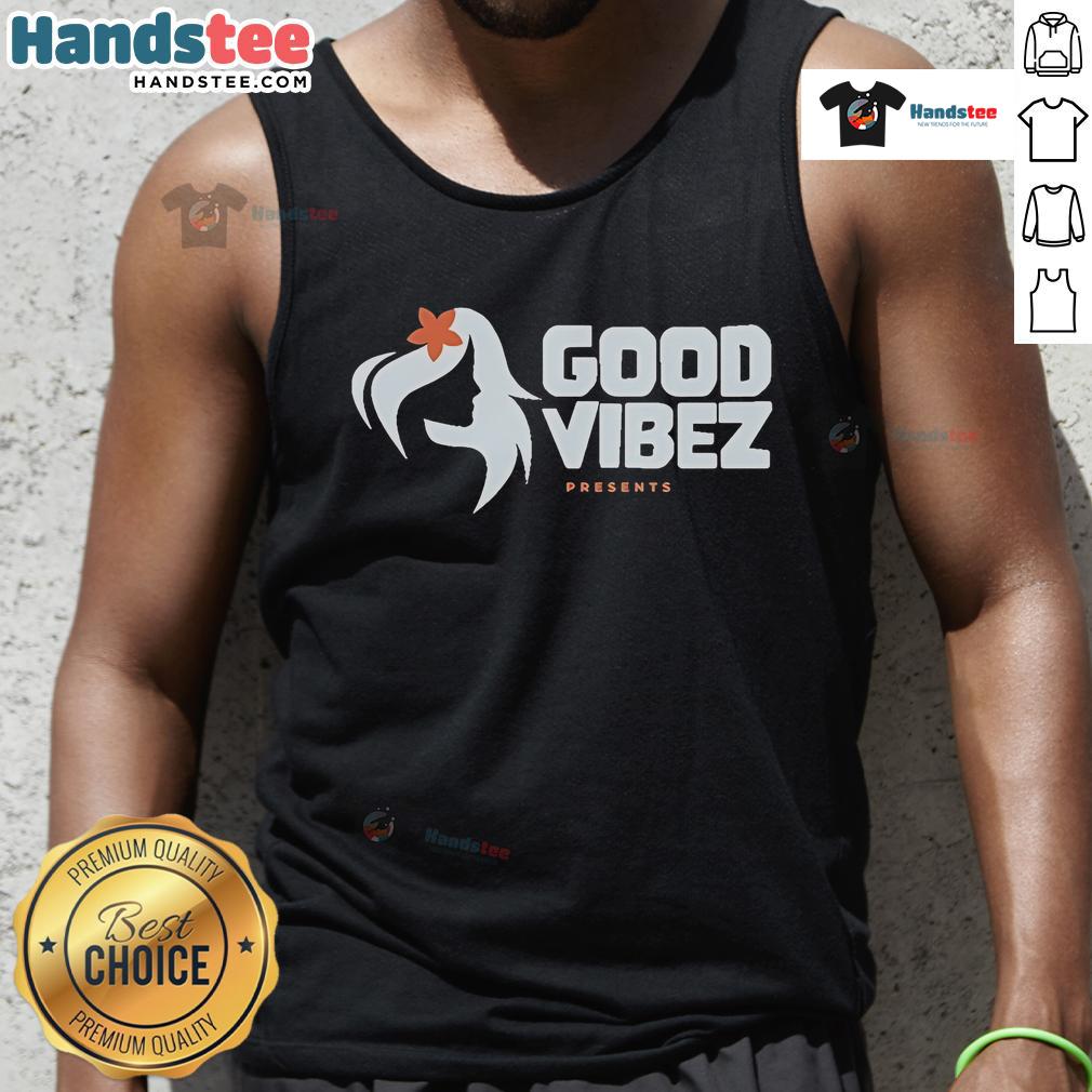 Good Vibez silhouette tank top displayed on a stylish mannequin against a vibrant backdrop, perfect for casual summer wear.