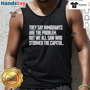 Hot tank top featuring the phrase 'Immigrants Are The Problem' with a reference to the Capitol storming incident.