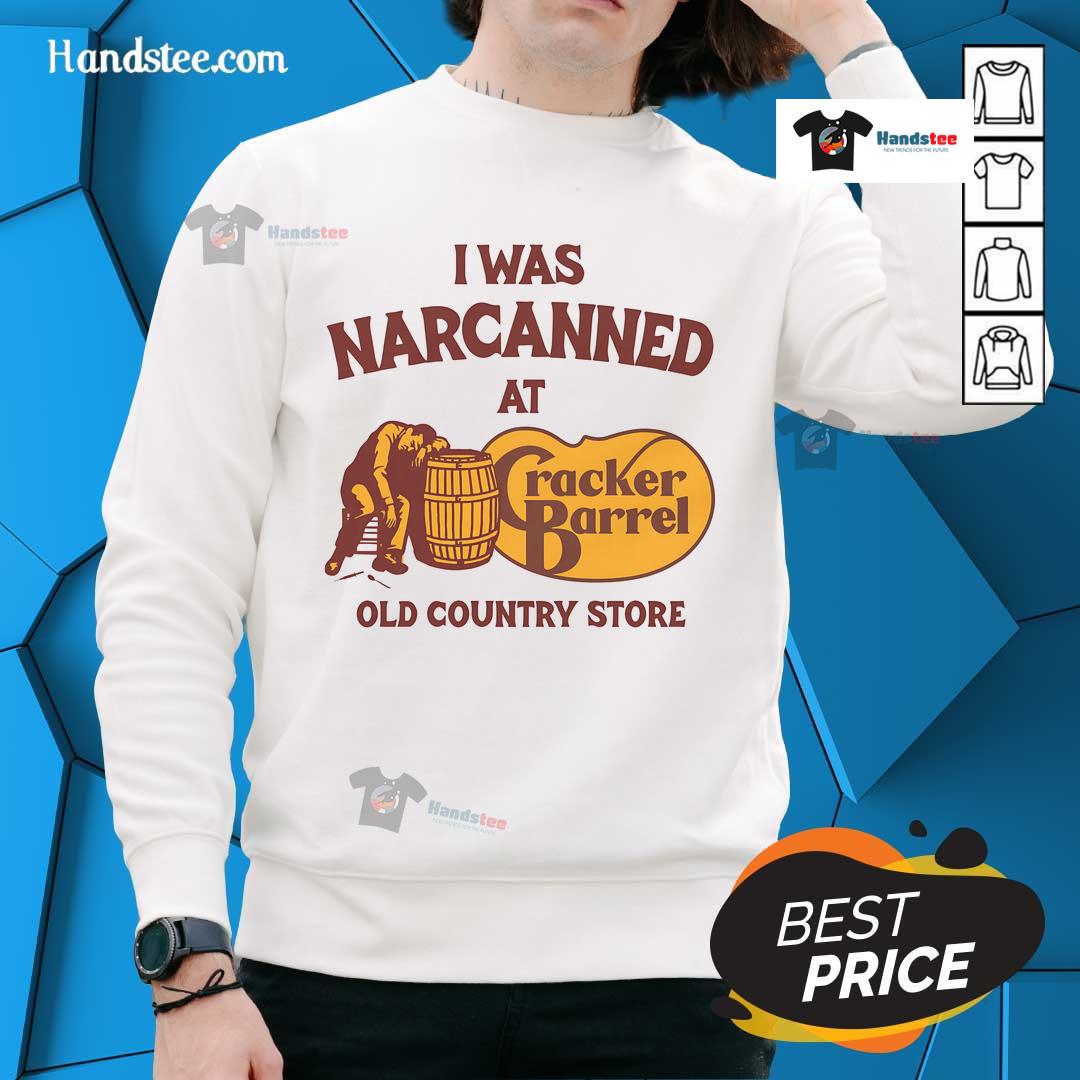 Cozy sweatshirt featuring 'Nice, I Was Narcanned' design at an old country store, perfect for casual wear.