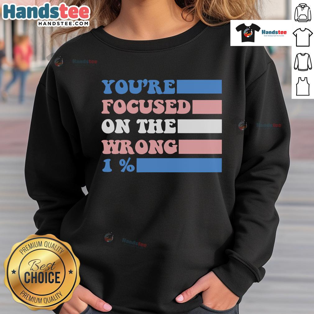 Stylish 'You're Focused on the Wrong 1 Percent' sweatshirt, perfect for motivational wear and casual outfits.