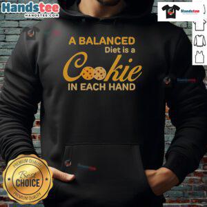 Cozy hoodie with 'A Balanced Diet Is A Cookie In Each Hand' text, perfect for food lovers and casual wear.