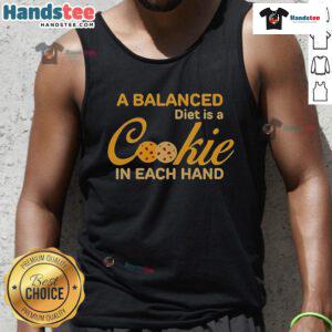 Person wearing 'A Balanced Diet Is A Cookie In Each Hand' tank top, showcasing a fun take on healthy eating habits.