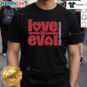 Alt Text: Official Christopher Titus Love Is Evol Logo T-Shirt featuring bold graphic design and vibrant colors.