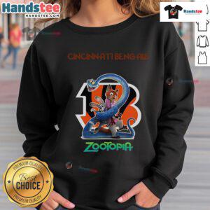 Alt Text: Official Cincinnati Bengals Zootopia 2 sweatshirt featuring vibrant team colors and unique graphic design.