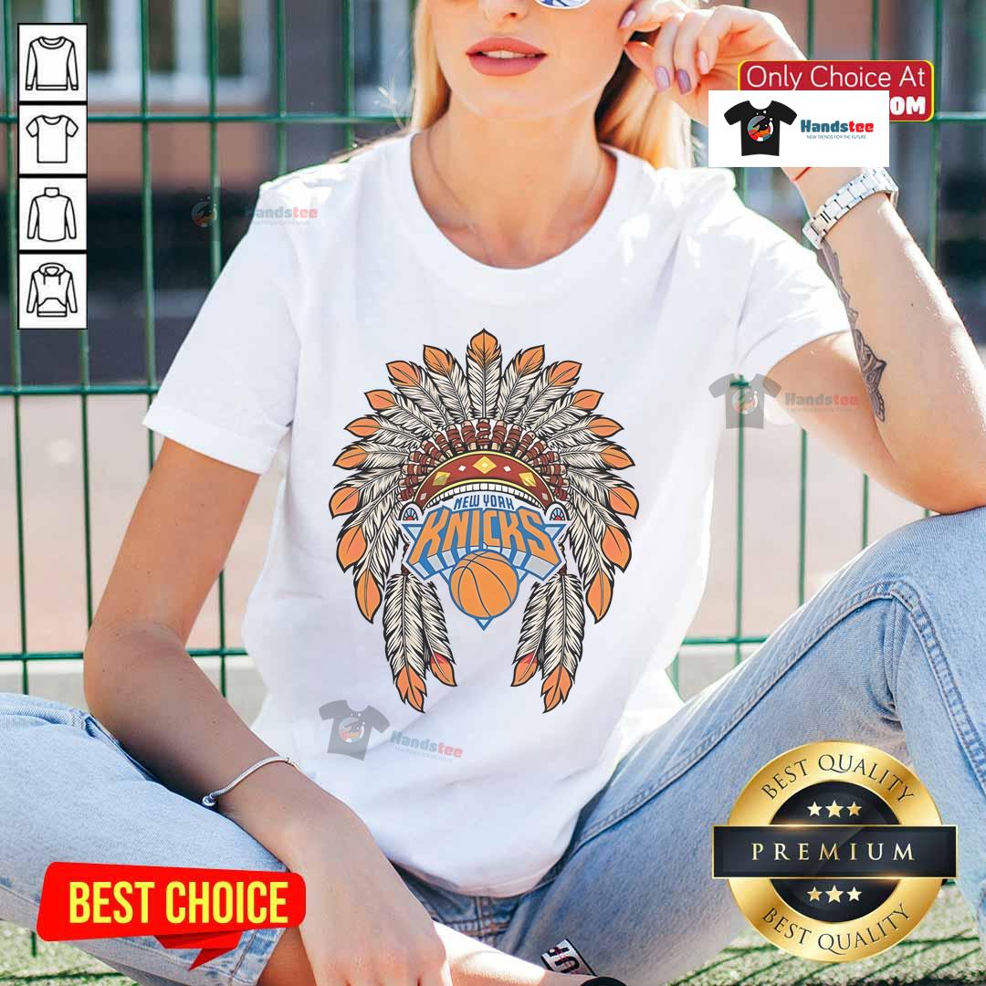 Alt Text: Official New York Knicks Native American Logo ladies tee featuring vibrant colors and stylish design for fans.