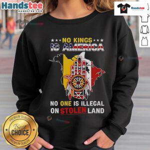 Official 'No King is America, No One is Illegal' sweatshirt design highlighting Native American land rights and social justice.