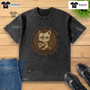 Cute washed t-shirt featuring a funny cat design fueled by coffee, perfect for cat lovers and coffee enthusiasts.