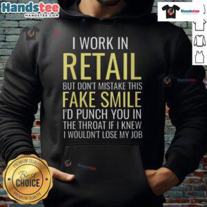 Funny 'I Work In Retail' hoodie with a sarcastic message about fake smiles and frustration in retail jobs.